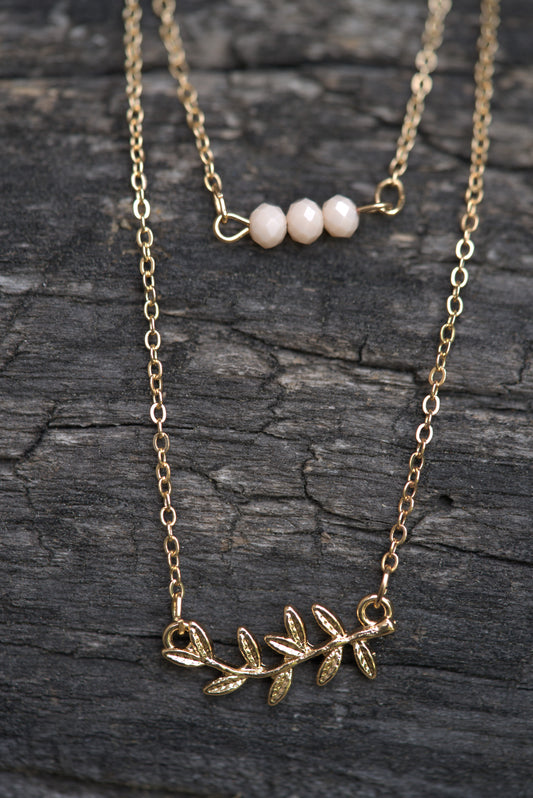 Gold Layered Necklace with Leaf Pendant and Beaded Bar Charm
