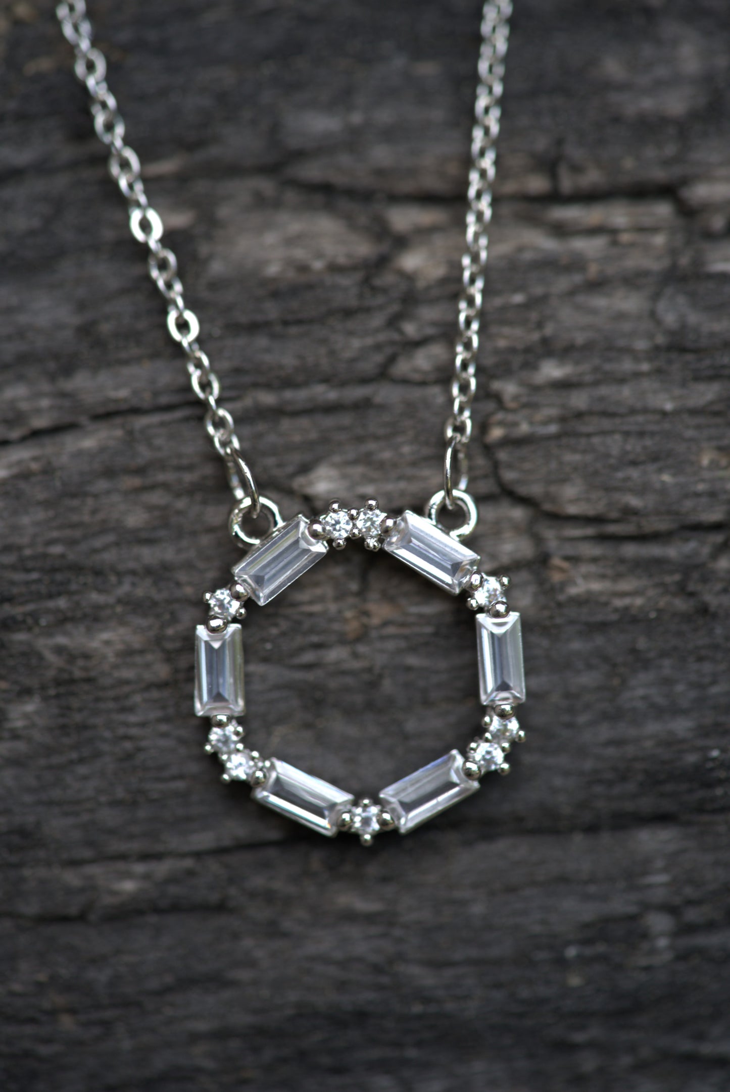 Stainless Steel Circle Necklace with Baguette and Round Cubic Zirconia Stones