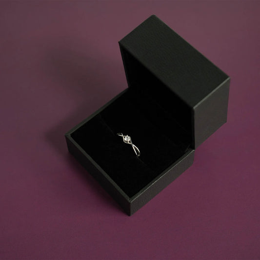 Stainless twisted band CZ stone